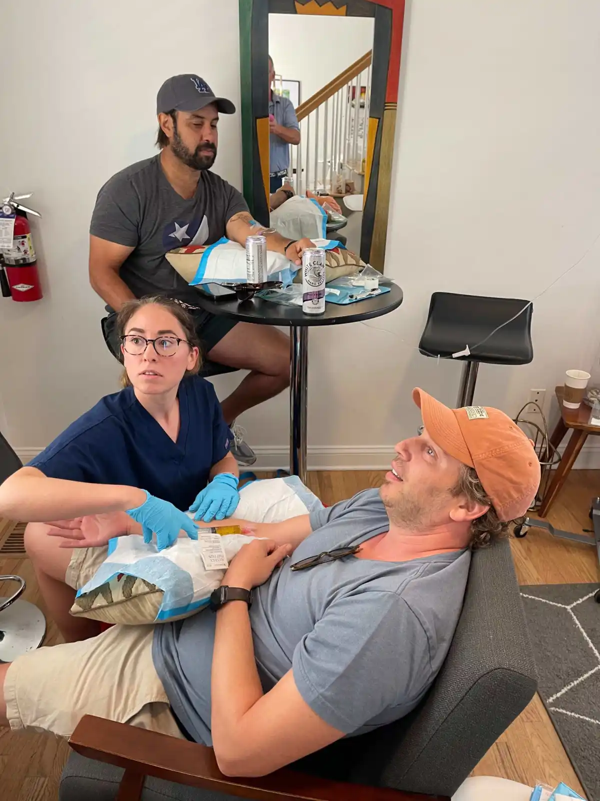 Doctor with patient looking at camera in Charleston, SC | The Drip Lounge