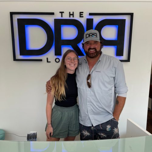 Smiling young woman with handsome man in Charleston, SC | The Drip Lounge