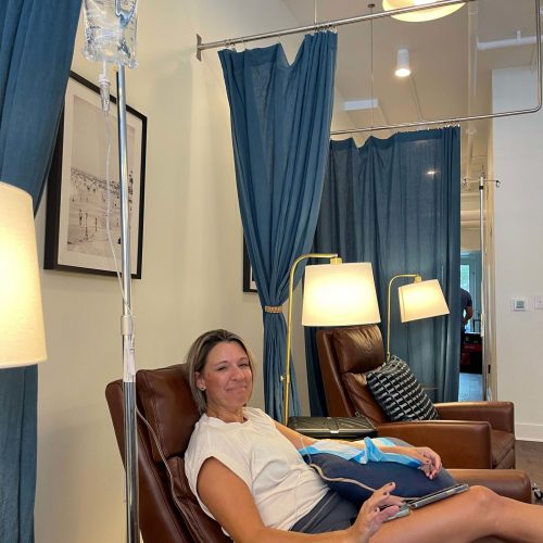 Smiling young patient looking at camera in Charleston, SC | The Drip Lounge
